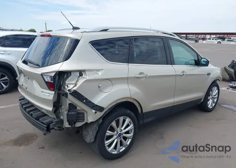 2017 Ford Escape Titanium z USA, uszkodzony, nr VIN 1FMCU0JD7HUD84006